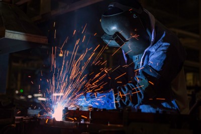 Industrial worker welding 