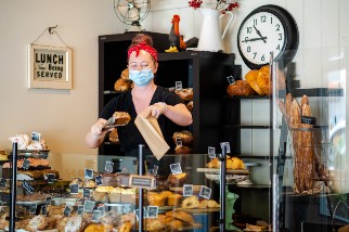 Bakery worker wearing a mask