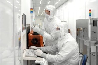 Closeup of workers in a semiconductor facility