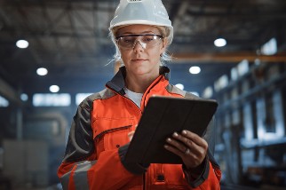 Closeup of a female industrial worker wearing PPE